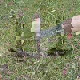 Spade pushed into the ground to make a slit Spade pushed into the ground to make a slit