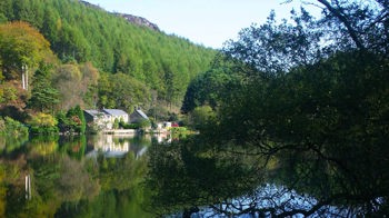 View of house across lake, Coed Hafod Y Llyn