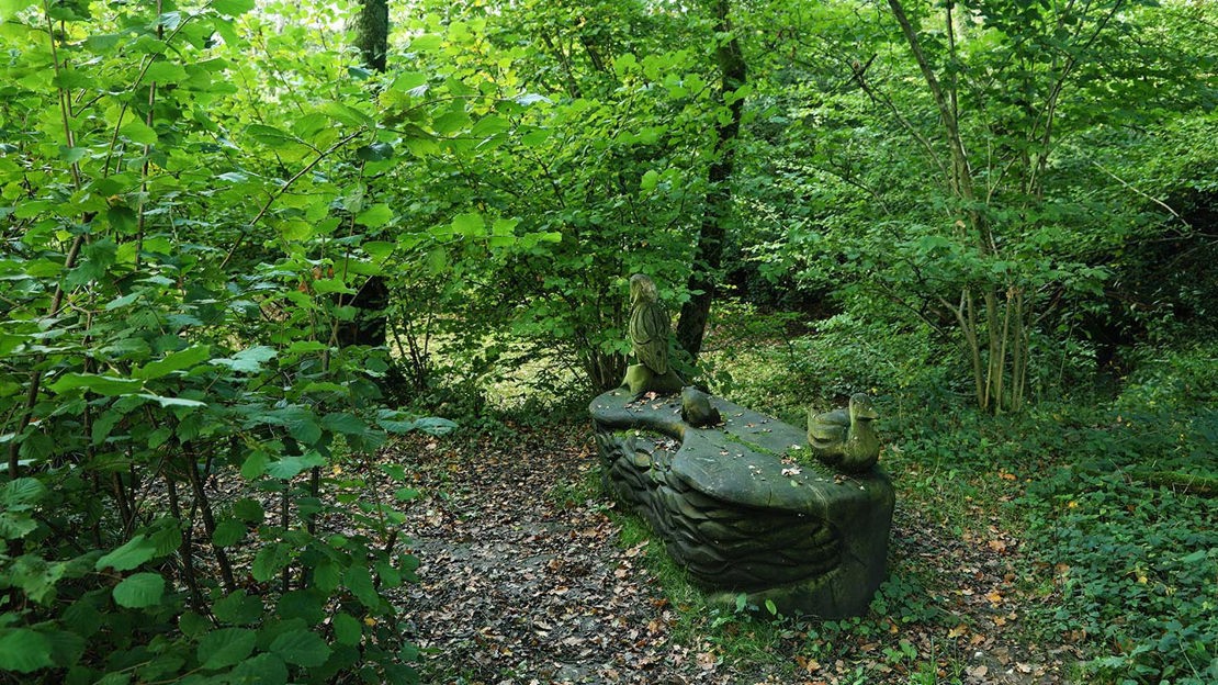 Stone bench with carved ducks, Home Farm