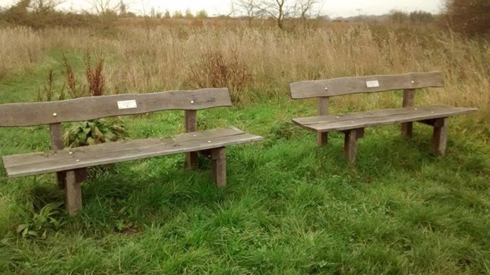 Two benches dedicated to family members