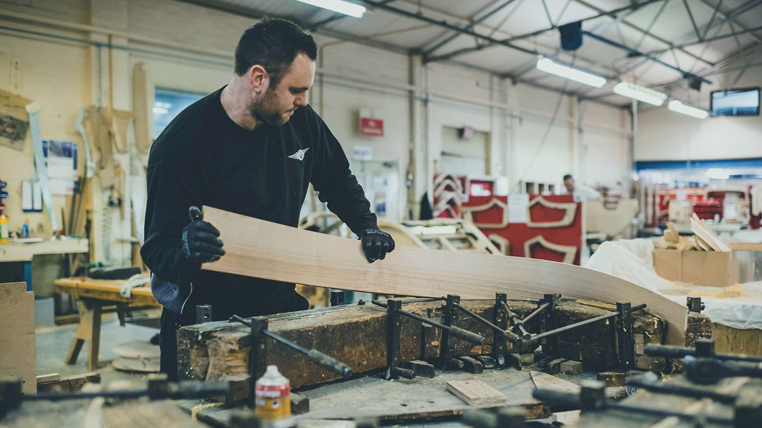 Morgan Cars factory worker manipulates ash