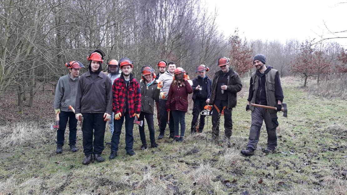 A group of volunteers with outdoor gear at Londonthorpe Woods