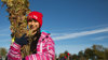 Girl holding oak saplings for tree planting at Heartwood Forest, November 2017
