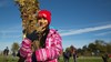 Girl holding oak saplings for tree planting at Heartwood Forest, November 2017