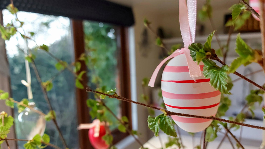 Egg hanging from Easter foraged centerpiece