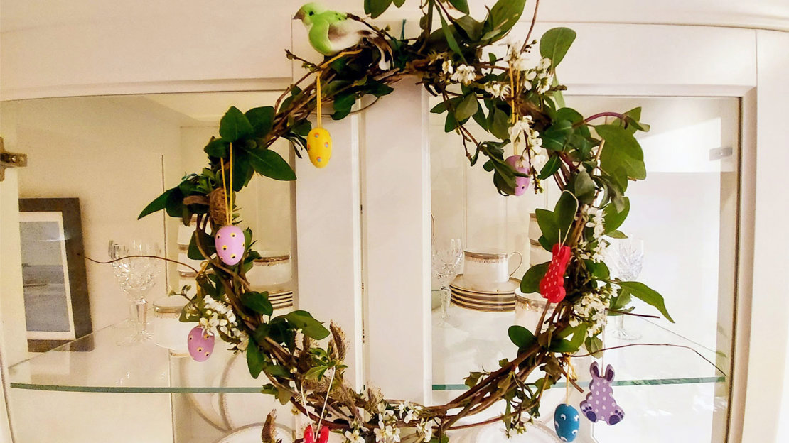 Foraged Easter wreath hanging on door
