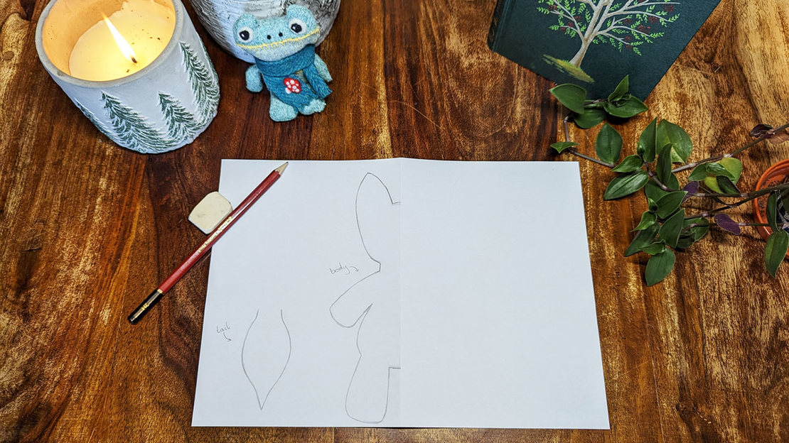 A drawing of a fox outline on a piece of paper