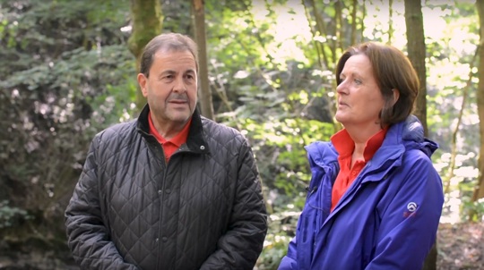 Volunteers Jon & Wendy Leach in a wood talking to camera