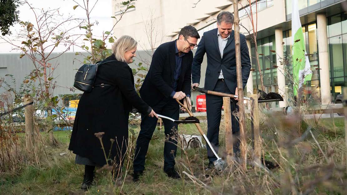 Cllr Karen Shore, Mayor Andy Burnham and Mayor Steve Rotheram planting a tree