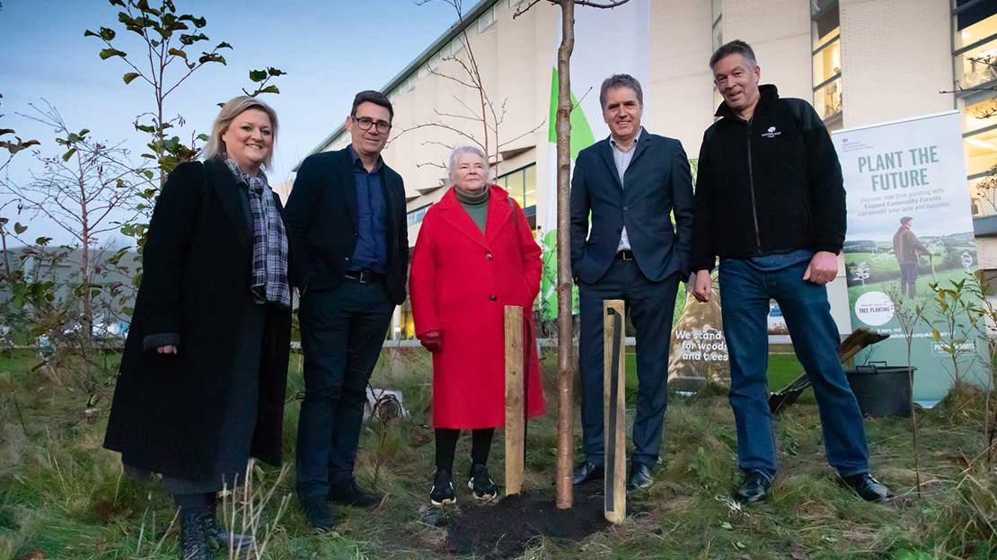 Mayors from across the Northern Forest area planting a tree