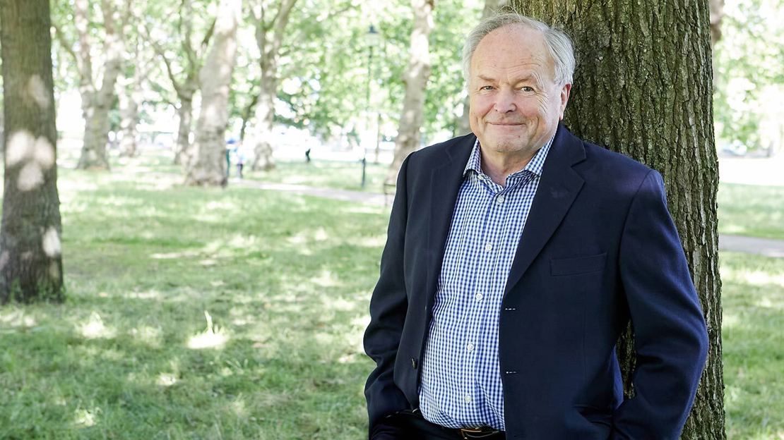 Clive Anderson, Trust president standing by a tree