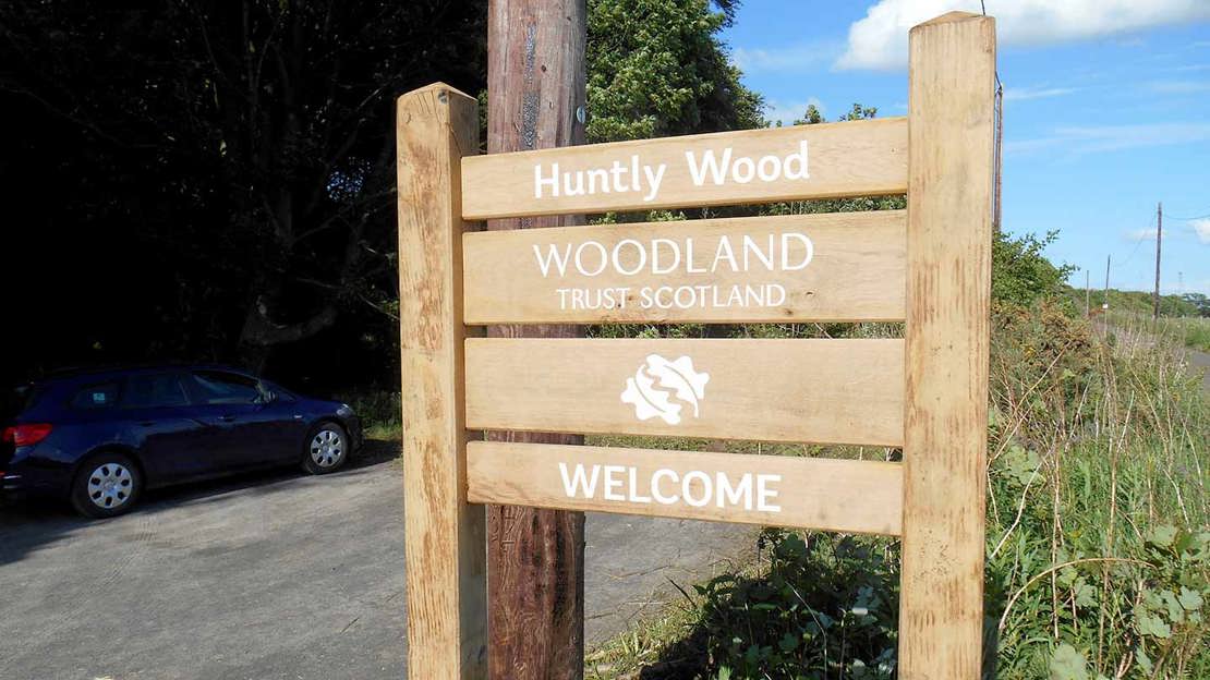Huntly Wood Welcome Sign