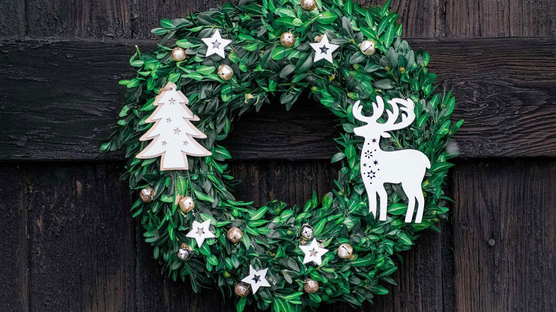 Christmas wreath on wooden door